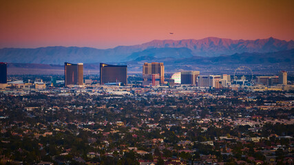 Aerial Las Vegas Skyline at Golden Hour with High Roller and Mountains © Nicholas J. Klein