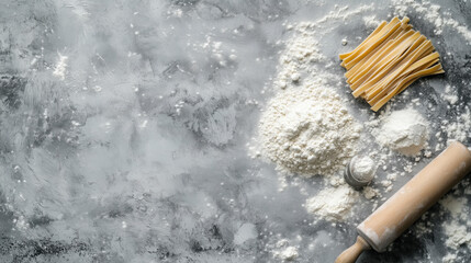 Flat Lay Composition of a Pasta Maker, Rolling Pin, and Scattered Flour on a Clean Gray Surface with Space for Text, Representing Handmade Pasta and Traditional Italian Cooking, Copy Space