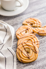 Sweet chocolate cookies on kitchen table.