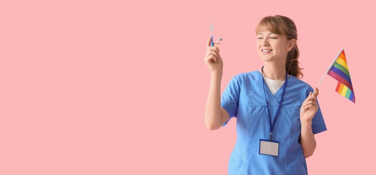 Female doctor holding LGBT flag, syringe and ampule on pink background with space for text. Vaccination concept