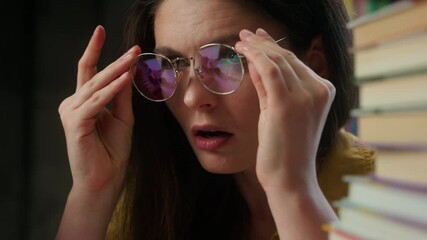 Tired exhausted girl high school student female teacher in eyeglasses overworked woman studying learning university education class health problem taking off glasses itchy eyes headache suffer tension