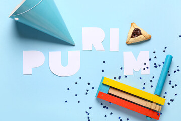 Composition with word PURIM, rattle, party hat and Hamantaschen cookie on color background