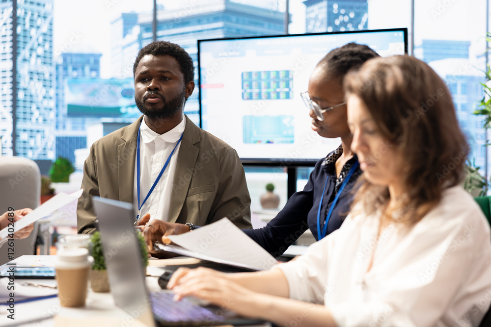 Poster forecast affiliates collaborating in a high end workspace to determine resource allocation plan for 