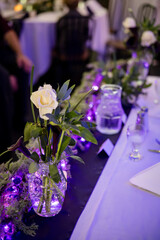 Purple light flower vases and decorations for wedding reception