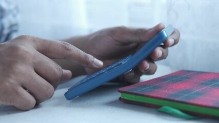 Business accounting concept, businessman using calculator , budgeting work on financial and accounting data with in office