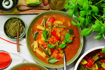 Minestrone soup with pesto.style hugge.selective focus