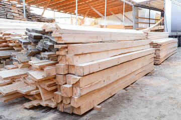 View of stacked wooden planks at sawmill
