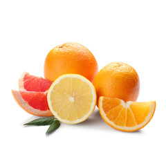 Different cut citrus fruits and leaves on white background
