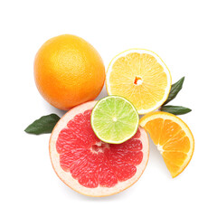 Ripe citrus fruits and leaves on white background