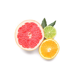 Halves of different citrus fruits with leaves on white background
