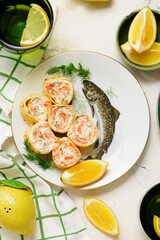  crepes rolls with cream cheese, salmon and dill. top veiw.