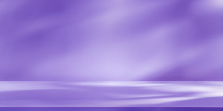 Empty table on pastel violet smooth wall. Background with leaf shadows, foliage on the wall. Mock up for presentation, branding products, cosmetics food or jewellery