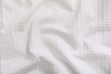 Texture of white towel as background