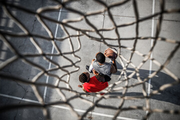 Above the Game: Aerial View of a Street Basketball Match