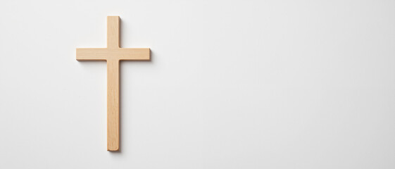 Wooden cross symbolizing faith and hope against a minimalist background, conveying serenity and spirituality