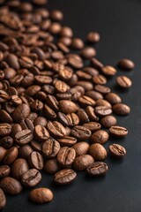 Close-Up of Coffee Beans on Black Background, Showcasing Texture and Shine