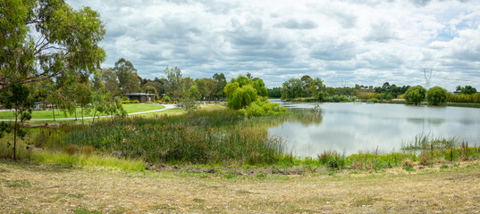 Panoramic view of Taylors Lake in Melbourne, Australia. A serene suburban park with wetlands, and native vegetation.Taylors Lakes Linear Park © Doublelee