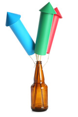 Bottle with colorful firework rockets on white background