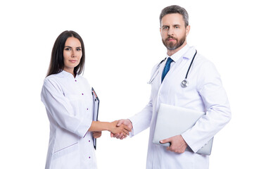 hospital teamwork collaboration. successful treatment. doctor handshake with nurse. two doctor...