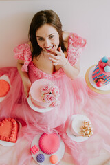 young woman with cakes