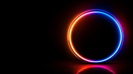 Obraz premium Glowing Neon Circle Frame Illuminated With Blue Pink And Red Lights On Black