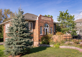 The building of the War Memorial Library on Queen Street in the town of Port Perry in Ontario, Canada, seen on a sunny autumn afternoon
