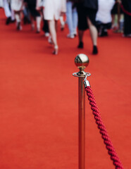 Red carpet with ropes and golden barriers on a luxury party entrance, cinema premiere tv film...