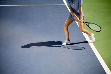 Legs of a girl playing tennis
