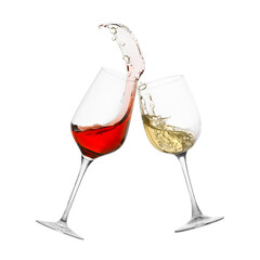 Glasses of splashing wine isolated on white