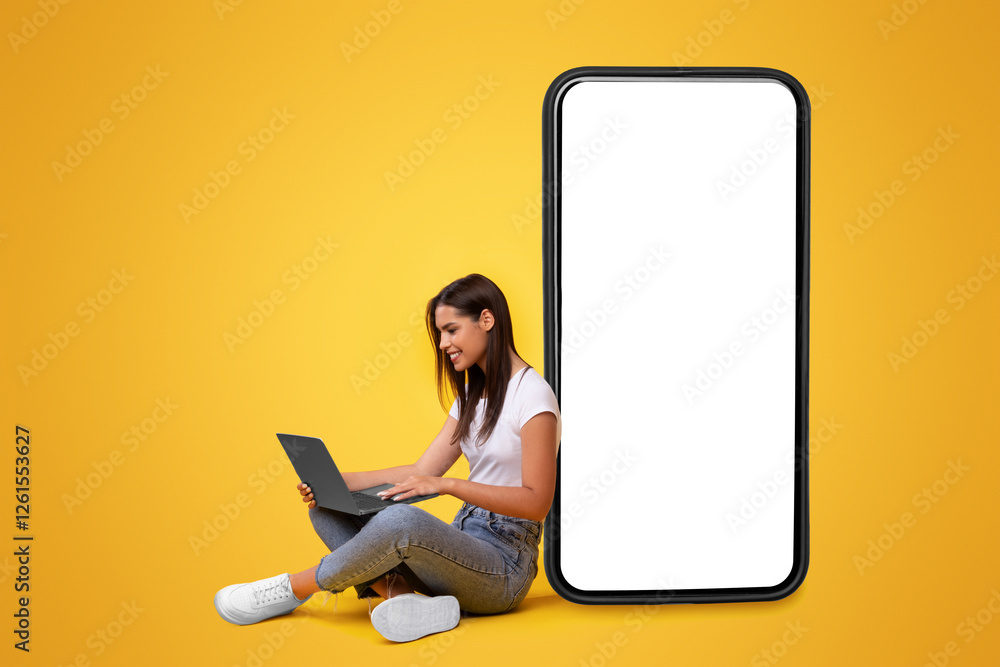 Poster people and technology. smiling woman using and looking at pc screen, sitting and leaning on big smar