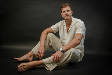 Blonde Male Model in Linen Shirt and Neutral-Toned Pants