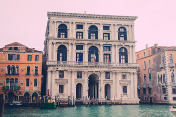 A grand historic building by the canal in Venice, Italy.