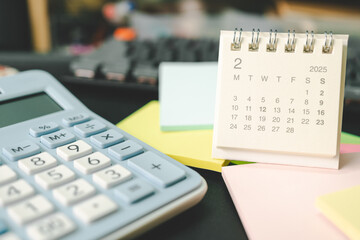 Desk calendar for FEBRUARY 2025 with Sticky note. Calendar concept with 2025 FEB calendar....
