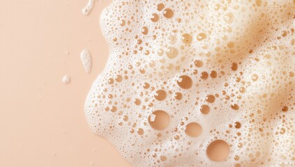 Light beige surface with creamy, foamy bubbles
