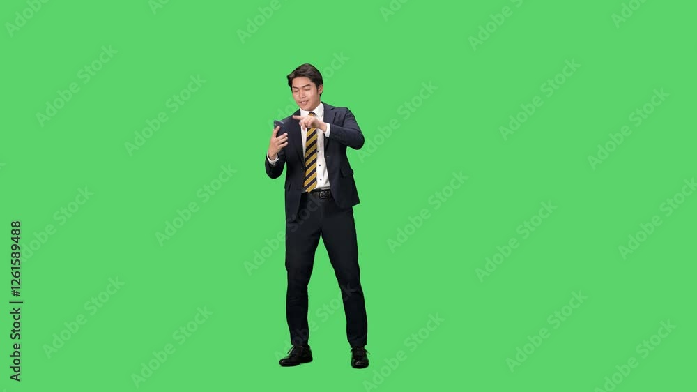 Poster スマホを使いながらダンスする男性ビジネスパーソンの全身動画　クロマキー合成用グリーンバック映像