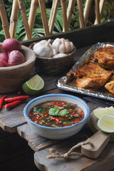 Tangy and Spicy Malay Dipping Sauce in a Bowl, Malay called Air Asam.