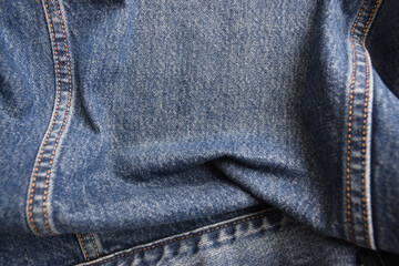 seam of blue denim texture background, jean fashion style