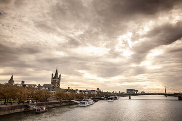 trankgassenwerft promenade on the rhine river in Cologne, Koln, Germany, with cruise ships waiting...