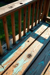 Rustic Wooden Bench with Peeling Light Teal Paint and Shadowy Detail