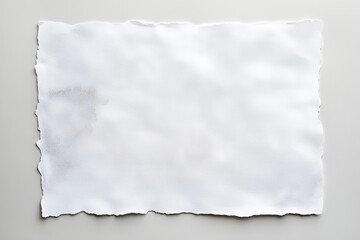 Obraz premium Blank white torn paper on light gray surface