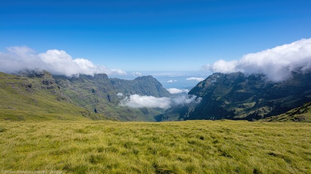 Mountain valley panorama, clouds, grass, hiking, scenic view, travel poster