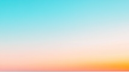 Serene gradient sky transitioning from blue to warm orange at sunset over calm waters