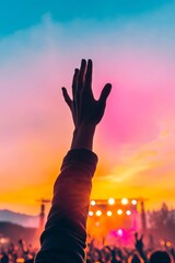 Immersive Festival Glow Vibrant Outdoor Crowd with Raised Hands and Dazzling Stage Lights - Social Engagement Content and Event Promotion for Youth-Centric Live Entertainment