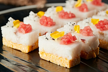 Two-color millet glutinous cake decorated with fruit grains