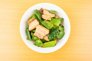A dish of braised pork with beans