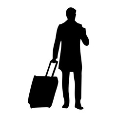 silhouette of person pulling suitcase