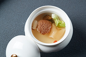 Hericium erinaceus, fish maw and hazel mushroom soup © 徐 建亮