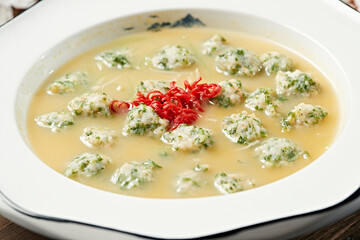 Shrimp balls with coriander and broth