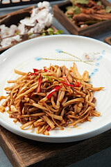 Stir-fried shredded pork with colorful peppers and king oyster mushrooms