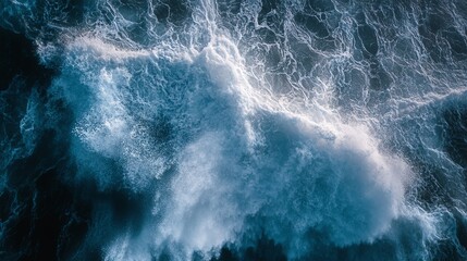 Strong Ocean Waves Crashing Against Rocks During a Vibrant Evening Sunset Near Coastal Cliffs